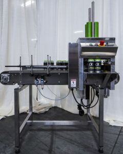 Minigun auto Paktech applicator for beverage canning and distribution with green paktech wide view