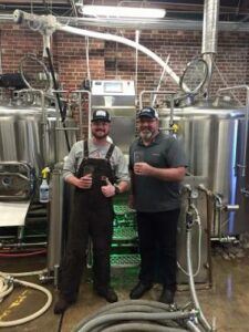 Sharing a Beer After Commissioning a Brewhouse